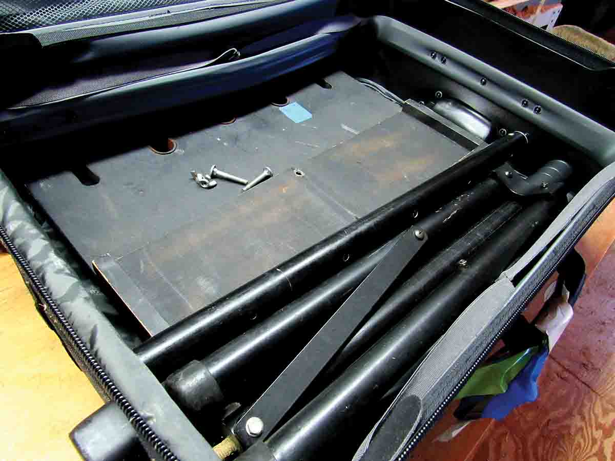 Shooting stand in suitcase.